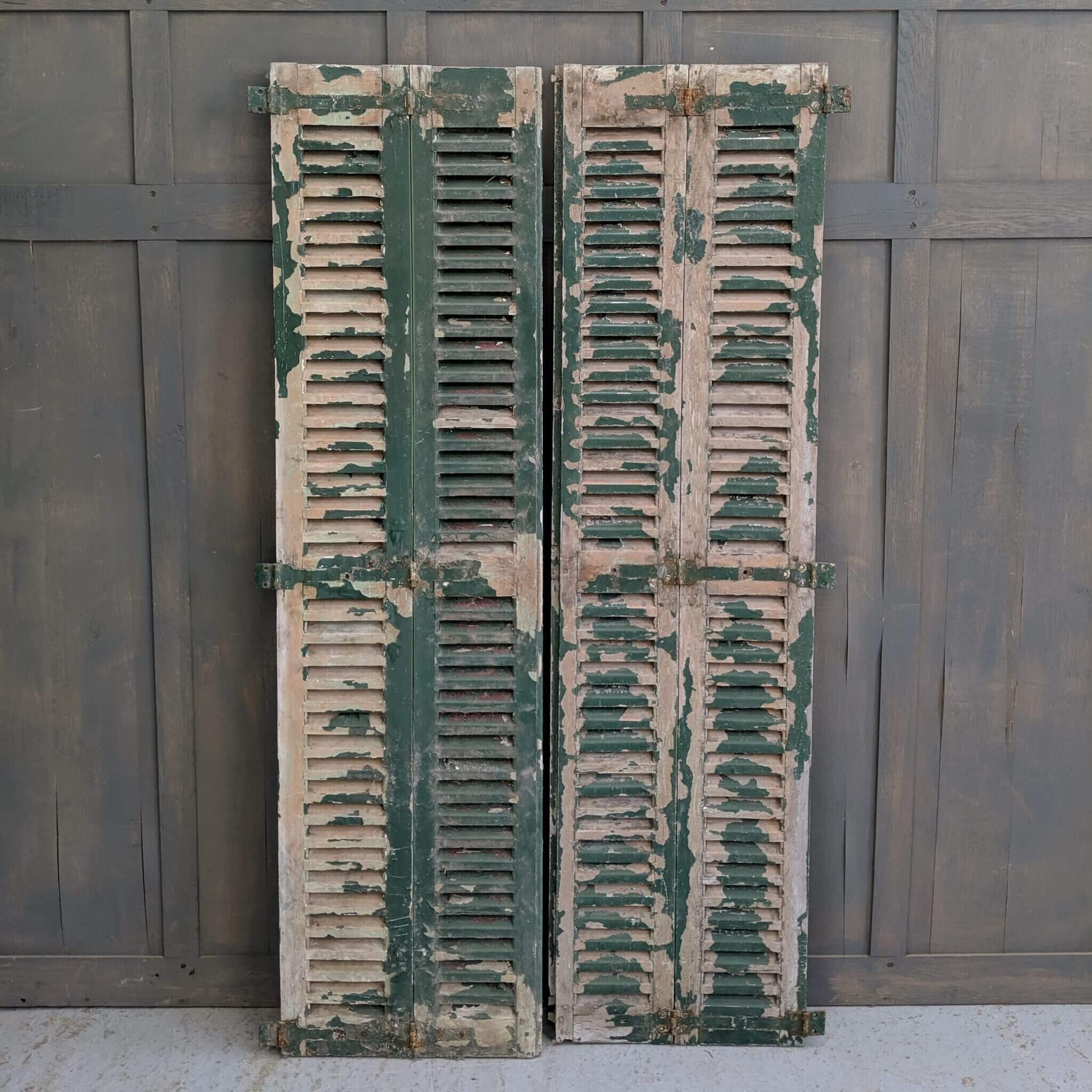 Pair of Distressed Green Painted European Louvre Shutter Doors (SOLD