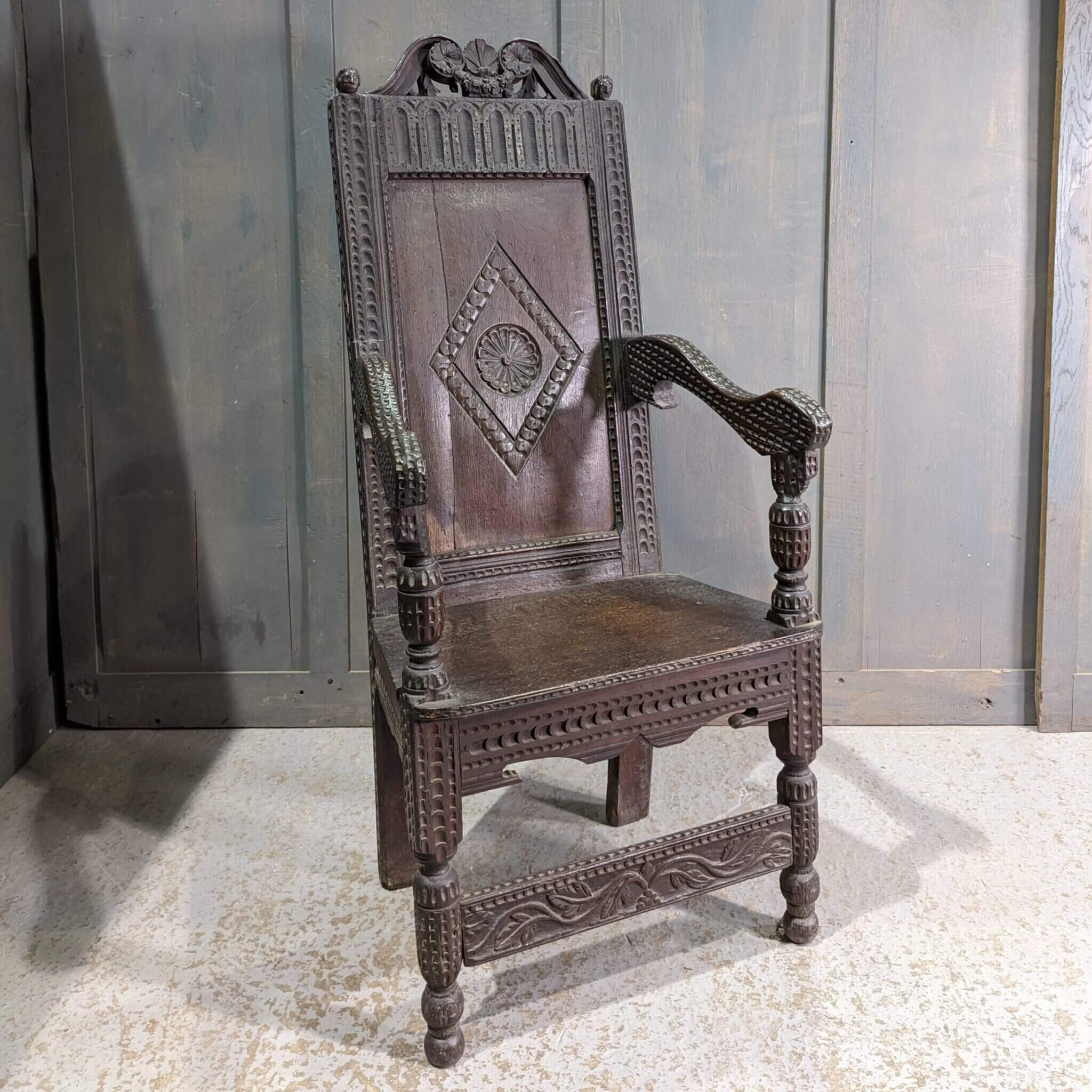 18th & 19th Century Carved Antique Oak Wainscot Chair with Heads (SOLD