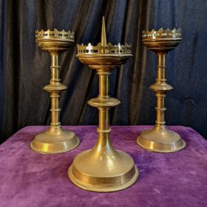Beautiful antique candle holders in church Stock Photo by travnikovstudio