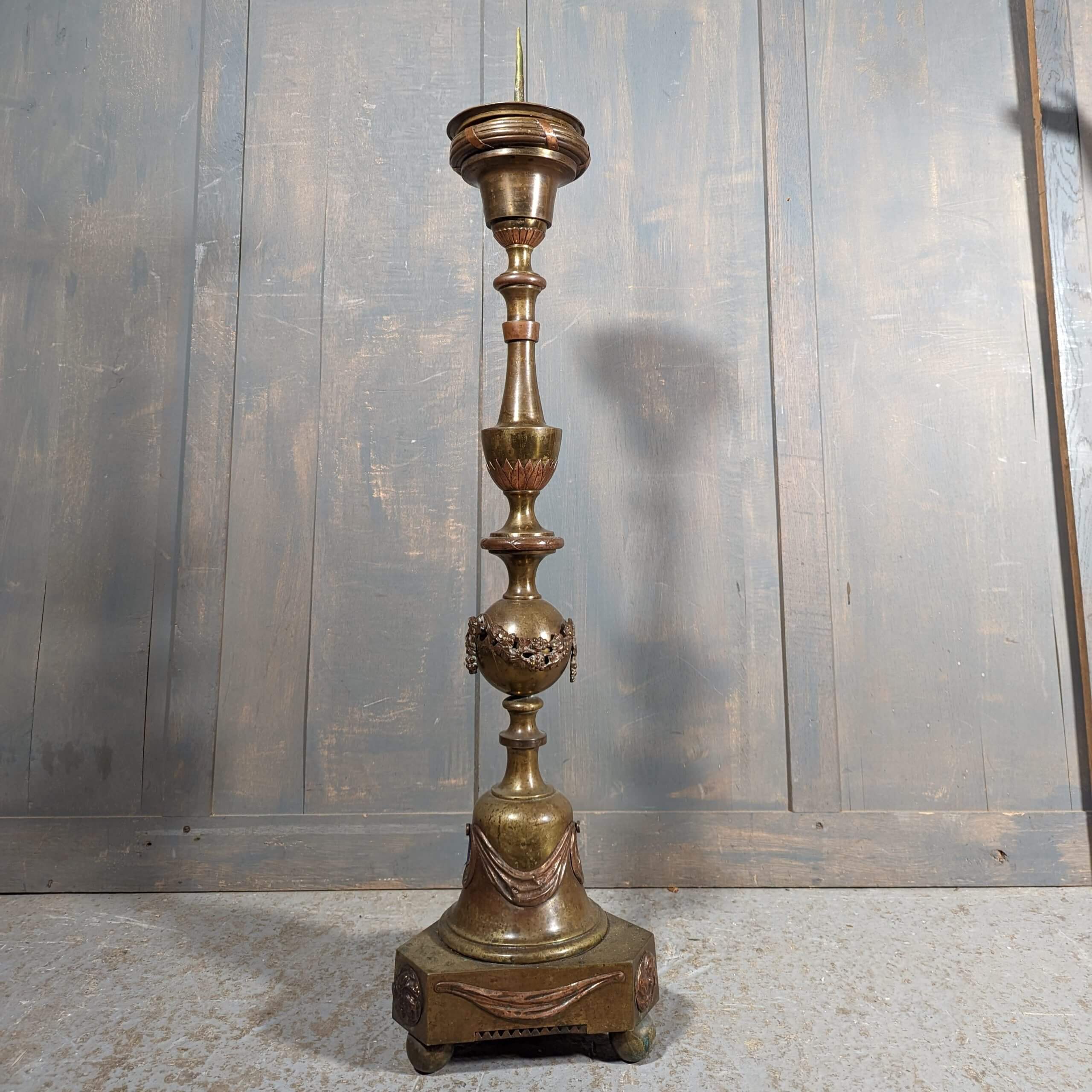 A pair of Floor Standing Church Candle Holders