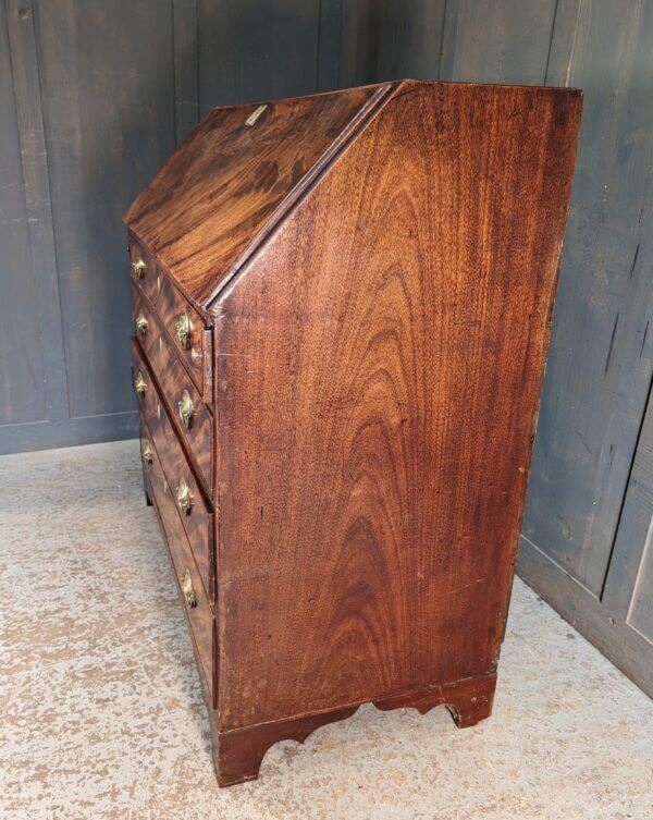 A Fine George III Mahogany Bureau With Original Brass Oval Handles