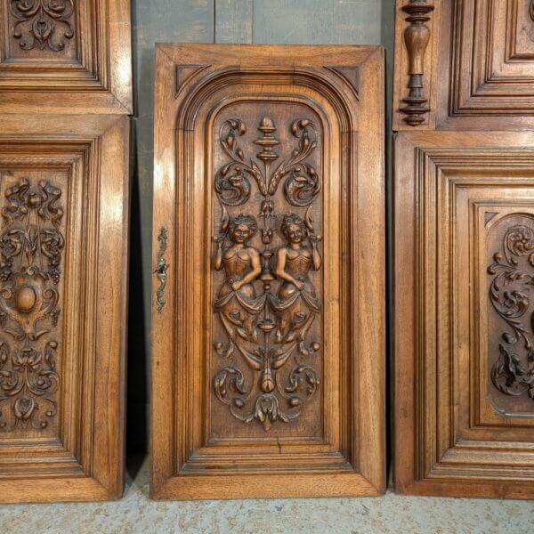 Late 19th Century Carved Walnut Panels with Figures Vines & Swags