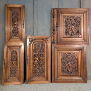 Late 19th Century Carved Walnut Panels with Figures Vines & Swags