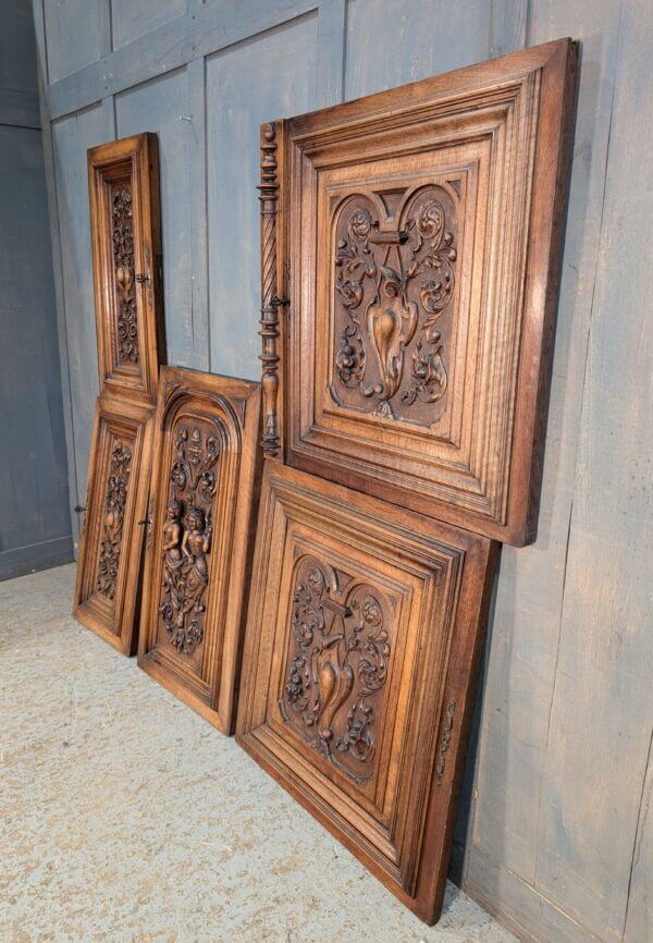 Late 19th Century Carved Walnut Panels with Figures Vines & Swags