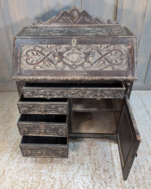 Highly Carved Dark Oak Late Victorian Bureau with Four Drawers & Cupboard