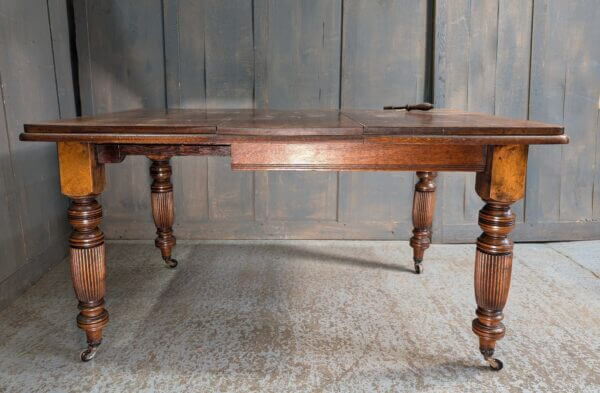 BARGAIN Oak Victorian Antique Wind Out Table with Fluted Legs & Winder