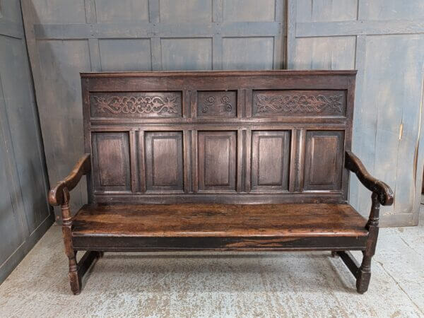 Handsome and Impressive Mid 18th Century Carved Dark Oak Settle Bench