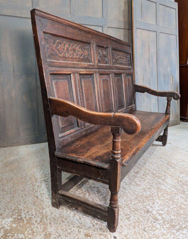 Handsome and Impressive Mid 18th Century Carved Dark Oak Settle Bench