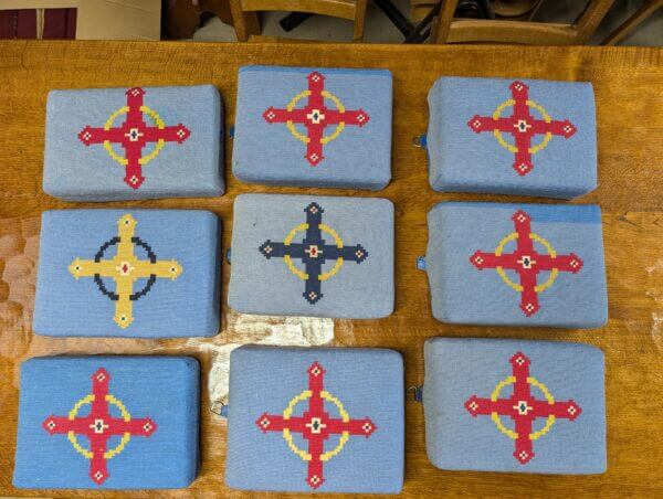 Beautiful Group of Nine Blue Hand Embroidered Crosses Church Hassocks with Resin Base from Holy Trinity Church Redhill