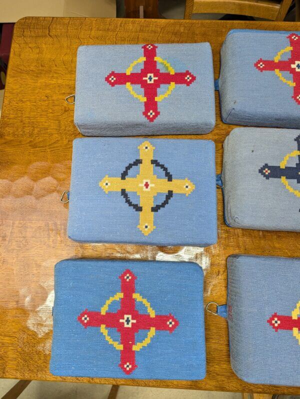 Beautiful Group of Nine Blue Hand Embroidered Crosses Church Hassocks with Resin Base from Holy Trinity Church Redhill