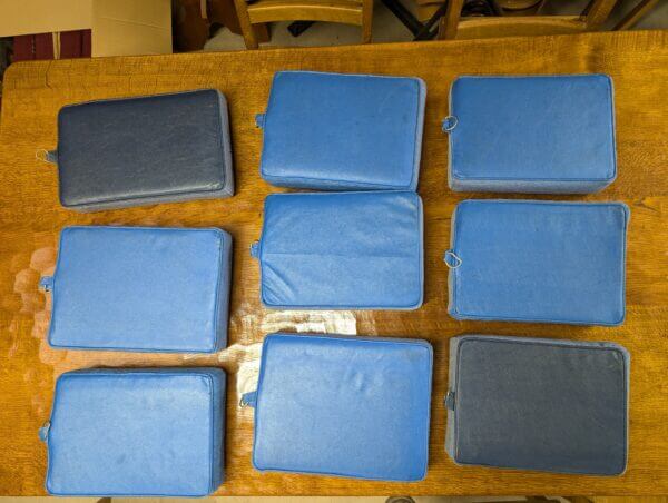 Beautiful Group of Nine Blue Hand Embroidered Crosses Church Hassocks with Resin Base from Holy Trinity Church Redhill