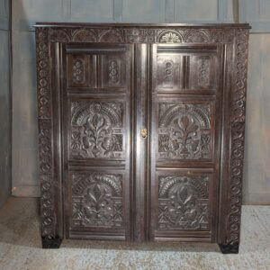 Tudor Style Carved Oak Housekeepers Cupboard Hanging Wardrobe