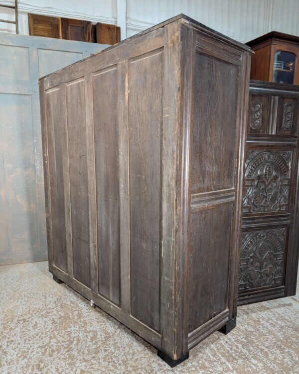 Tudor Style Carved Oak Housekeepers Cupboard Hanging Wardrobe