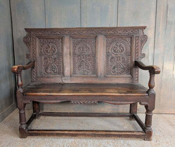 18th Century Carved Oak & Elm Settle with Triple Panel Back