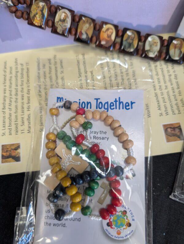 Fun Collection of Catholic Accessories - Rosary, Teresa Plate, Holy Family in a Packet, Holy Bracelet