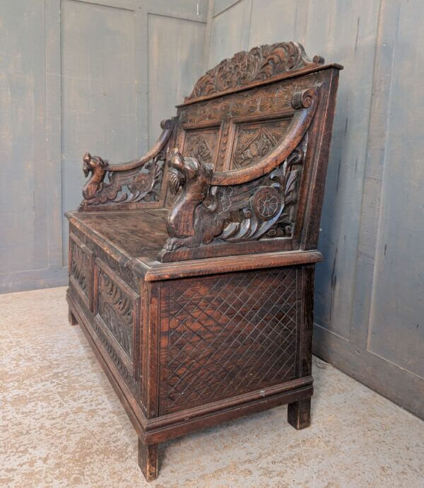 17th Century Style Antique Carved Oak Monks Bench with Griffins