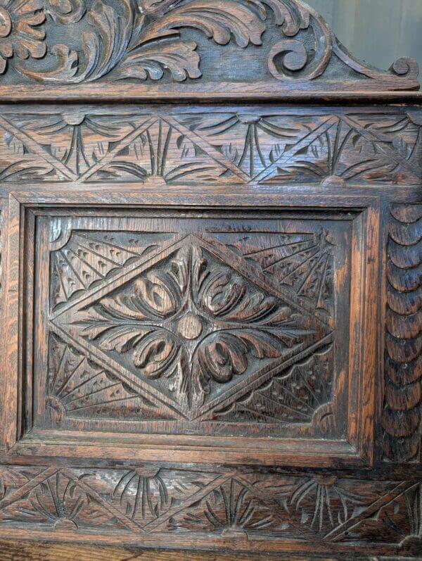 17th Century Style Antique Carved Oak Monks Bench with Griffins