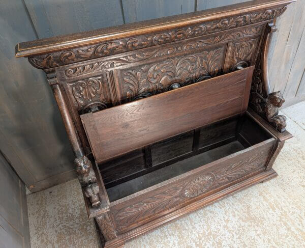 16th Century Style Highly Carved Oak Monks Bench with Romayne Heads