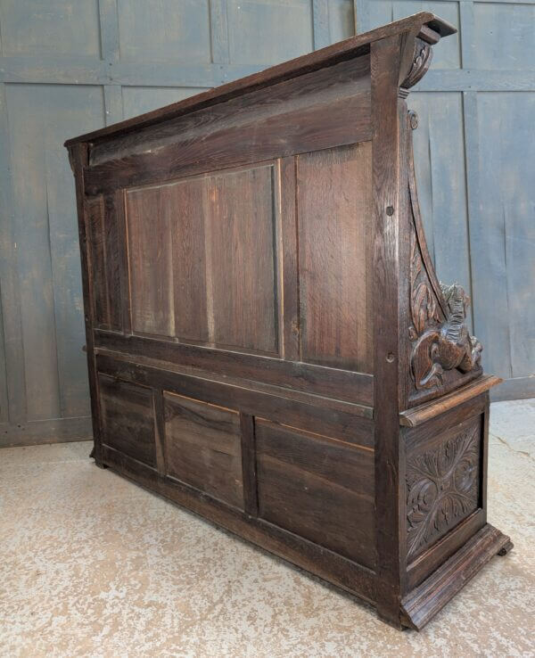 16th Century Style Highly Carved Oak Monks Bench with Romayne Heads