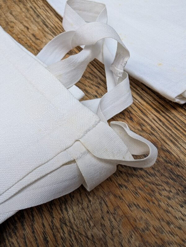 A Box of 11 Amices in Linen, Cotton and Fine Cotton