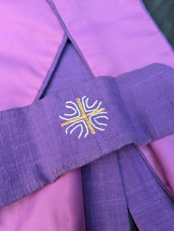 Two 1960's-70's Embroidered Broad Stoles Cream & Purple