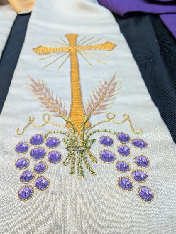 Two 1960's-70's Embroidered Broad Stoles Cream & Purple