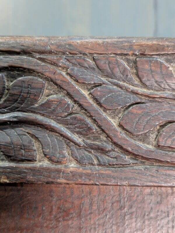 Early 17th Century Oak Panel Back Settle with Carving