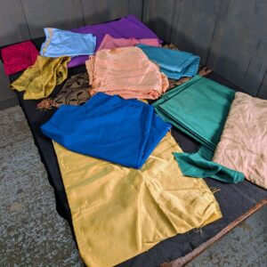 Box of Many Coloured Different Sizes Fabric and Material