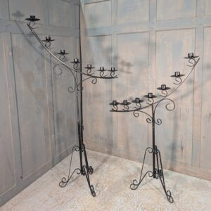 Pair of Black Wrought Steel Large Adjustable Seven Branch Benediction Candelabra