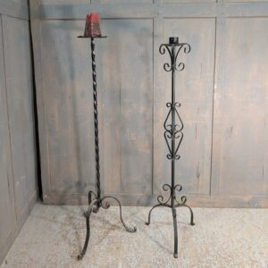 Two Wrought Black Painted Steel Pavement Candleholders