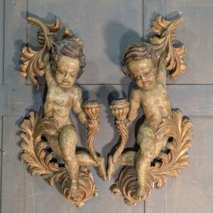 A Pair of Rare Continental 16th Century Torchere Holding Putti Angles from a Retablo