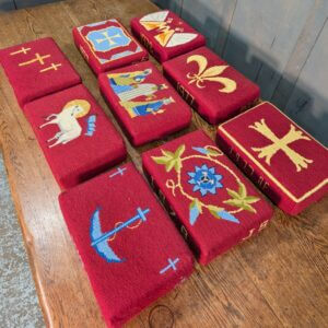 Harlequin Set of Red Hassocks Kneelers Cushions with Different Symbols