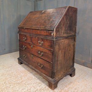 Early George II Oak Bureau with Wavy Drawers