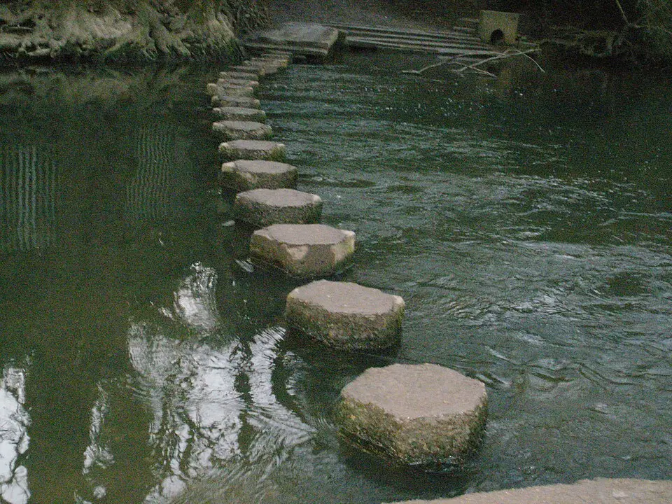 Octagonal stepping stones crossing the River Mole at the foot of Box Hill